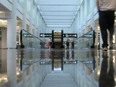 picture of people walking across a shiny floor