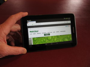 Someone holding a tablet computer